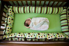 как выбрать кроватку для новорожденного